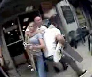 in-this-image-taken-from-amatuer-video-a-police-officer-and-skateboarders-are-seen-scuffling-on-a-sidewalk-in-hot-springs