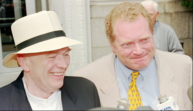 jim-mcdougal-left-and-his-lawyer-sam-heuer-talk-to-reporters-in-this-1996-file-photo-heuer-died-dec-22-2007-after-battling-cancer-for-four-months