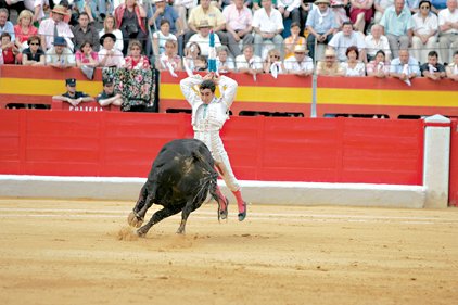 david-fandila-prepares-to-strike-a-blow-against-a-bull-in-the-matador