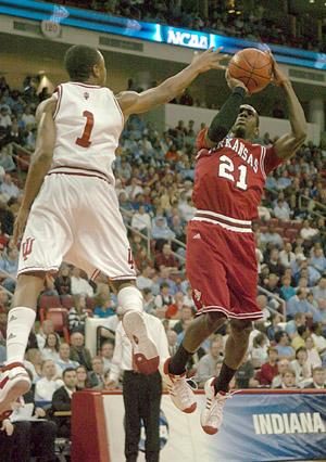 University of Arkansas's Patrick Beverly takes a shot over Indiana defender Armon Bassett during the first half of Fridays first round game in the 2008 NCAA Division I basketball tournament at the RBC Center in Raleigh North Carolina.