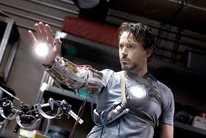 as-tony-stark-robert-downey-jr-shows-off-the-power-of-the-awesome-armor-that-transforms-his-character-into-iron-man