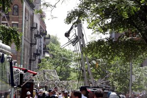 part-of-a-crane-collapsed-on-91st-street-on-new-yorks-upper-east-side-on-friday-the-crane-smashed-into-a-23-story-apartment-building-before-crashing-onto-the-street-below-and-killing-at-least-one-person