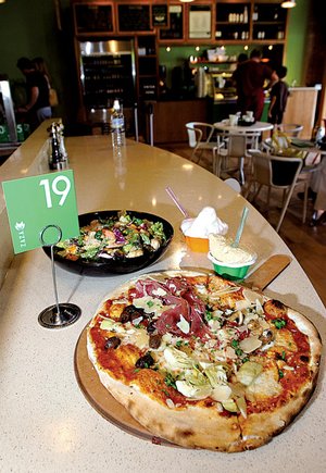 Quattro Stagioni (Four Seasons) is one of 12 pizzas on ZaZa's menu,
along with 10 salads including The Asian. About 20 flavors of gelato
are available.