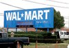 The sign for Wal-Mart Stores Inc. headquarters in Bentonville is shown in this file photo. 