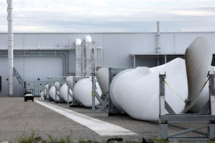 windmill-turbine-blades-are-lined-up-near-the-lm-glasfiber-facility-in-the-little-rock-port-area-in-this-october-2008-file-photo