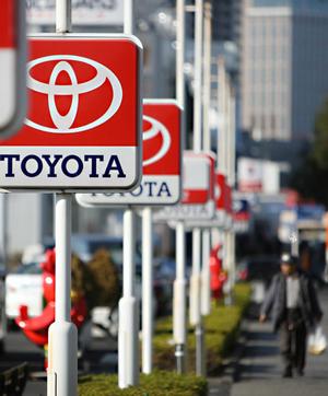 The logo for Toyota Motor Corp. is displayed at a dealership in Yokohama City, Kanagawa Prefecture, Japan.