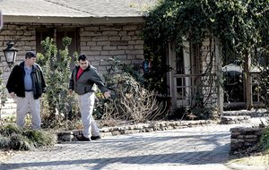Investigators on Friday examine the West Memphis home of Trent Pierce, who was critically injured in an explosion Wednesday.