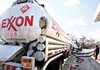 An Exxon tanker truck makes a refueling stop in Arlington, Va.