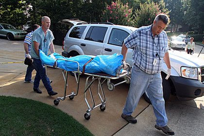 the-body-of-todd-bostian-is-removed-from-near-the-home-at-144-blue-heron-drive-on-lake-hamilton-in-hot-springs-on-friday-morning