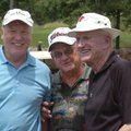 Former Dallas Cowboy Cliff Harris (left) visits with former Arkansas Athletic Director Frank Broyles...