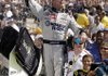 Jimmie Johnson revels after his victory over teammate Mark Martin (Batesville) in the Allstate 400 at the Brickyard at the Indianapolis Motor Speedway in Indianapolis on Sunday.