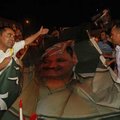 Supporters of Massoud Barzani celebrate in Irbil, Iraq, his apparent victory in weekend elections in...