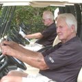 Former Arkansas Athletic Director Frank Broyles (left) and Pat Summerall prepare to head out for the...