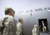  	U.S. Defense Secretary Robert Gates, right, walks off an Air Force C-17 as he arrives in Baghdad, Iraq, Tuesday, July 28, 2009.