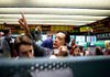 Traders await the natural-gas inventory numbers on July 9 at the New York Mercantile Exchange.