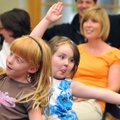 Abigail Alexander, 5, left, and Hannah Steffens, 4, both of Bentonville, danced around while the Sug...