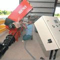 n Friday, Mark Speakman with Marck Industries prepared to paint a machine that is used to compact St...