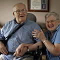 Roger Bushee of Bella Vista, a WWII vet, and his wife Maxine share a moment as he talks about his ex...