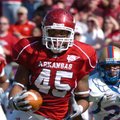 Arkansas sophomore tight end D.J. Williams (45) looks up field after making a catch during the Hogs'...