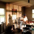 Kyle DeVito, chef at Mary Maestri's in Tontitown, cuts meat Saturday evening while preparing for pat...