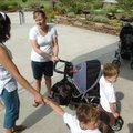 Moms Offering Moms Support Club members Amy Beaty, right, and Steffi Kellam talk during the Botanica...