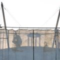 <b>Top of the tower</b>
A worker on the Bentonville water tower stopped to talk on his cell phone a...