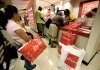 Shoppers like these Friday at a new J.C. Penney store in New York City are seen as a sign of growing consumer confidence.  