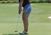 Fayetteville High School junior Alex Del Sol putts on the ninth green during the Springdale High School Bulldog Invitational Tuesday at the Springdale Country Club.