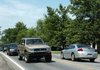 Traffic backs up at the intersection of Garland Avenue and Sycamore Street on Tuesday in Fayetteville. The City Council on Tuesday authorized Mayor Lioneld Jordan to discuss a project to widen Garland with state highway officials.

