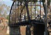 FILE — The bridge at War Eagle Mill is a key attraction for tourists during arts-and-crafts weekend.