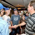 <b>Meet your host</b>
Tanner Rich, left, of Bryant shook hands as he met his host, Bryan Roath, at ...