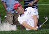 Padraig Harrington hits from the sand to the sixth hole during Thursday's first round of the Bridgestone Invitational at Firestone Country Club in Akron, Ohio. Harrington leads the tournament at 6-under par.