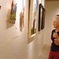 Kathy and Dave Reece look at some of the pieces displayed at the Fayetteville Underground on Thursda...