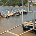 After helping launch a floating gangway from a truck, North American Marine employee Daniel Lawrence...