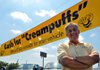 Dennis Bergthold, the owner of 2 B's Auto Sales in Siloam Springs, stood in front of a sign he put up yesterday in front of his car lot.  The 'Cash for Clunkers' promotion is helping new auto dealerships but is also hurting the used-car dealers by drying up their supply pipeline.
