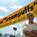 Dennis Bergthold, the owner of 2 B's Auto Sales in Siloam Springs, stood in front of a sign he put u...