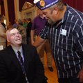 <h3>Purple Heart ceremony:</h3>U.S. Army Pfc. Adam Watkins, left, talks with Military Order of the P...