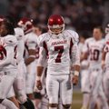 Arkansas kicker Alex Tejada leaves the field after missing a field goal late that would have tied th...