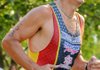 After swimming 500 yards and bicycling 15 miles, John Owen from Rogers began a 5K run on his way to victory in the men's division of the Shark Sprint Triathlon at Horseshoe Bend Park on Beaver Lake on Sunday.
