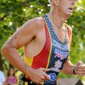 After swimming 500 yards and bicycling 15 miles, John Owen from Rogers began a 5K run on his way to ...