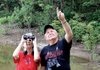 Hoolie and Pat Alcorn of Mankato, Kan., were led on a birding expedition to Oak Bower at Lake DeGray near Bismarck.