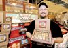 Michael Staiber of Drew Estate shows off a box of Kaya cigars on Saturday at the 77th annual trade show of the International Premium Cigar & Pipe Retailers Association in New Orleans.