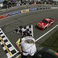 NASCAR Sprint Cup points leader Tony Stewart takes the checkered flag at Watkins Glen (N.Y.) Interna...
