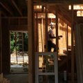 <b>Green construction</b>
Damien Cooke, owner of Cooke Construction in Fayetteville, ascends a set ...