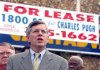 Assistant Attorney General Jim DePriest speaks about the closures of payday lending stores thoughout Arkansas as he stands with opponents of the stores in front of a closed store along Asher Ave. on Tuesday morning.