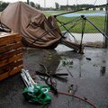 <b>After the storm</b>
Speakers, chairs and garbage cans were scattered between the bleachers Monda...
