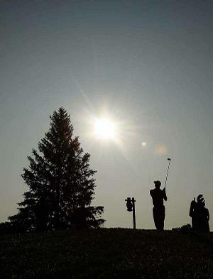 Tiger Woods, watching his tee shot on the seventh hole during a practice round Tuesday at Hazeltine National
Golf Club in Chaska, Minn., has only the PGA Tournament left if he is going to win a major in 2009. To Woods, it doesn't matter. This time last year he was recovering from knee surgery.