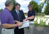 Jim Buckner, senior vice commander of the Military Order of the Purple Heart in Arkansas, from left, talks with U.S. Sen. Mark Pryor and Sam Sansom, president of the Northwest Arkansas Chapter of the Military Officers Association of America, about the possibility of buying more land to expand the Fayetteville National Cemetery on Tuesday at the cemetery in Fayetteville. Pryor is traveling around the state of Arkansas this month to hear from constituents. 