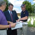 Jim Buckner, senior vice commander of the Military Order of the Purple Heart in Arkansas, from left,...