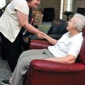 <b>Touring Legacy Village</b>
Julie Waterhouse of Salem, Ore., greeted resident Corinne Jacobson wh...